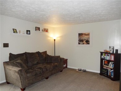 Neutral walls in the living room makes it easy to 