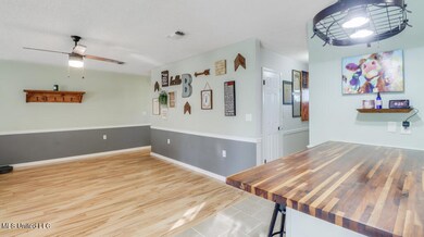 Living Room Continued/ Kitchen