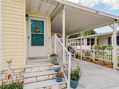 Property entrance featuring a porch