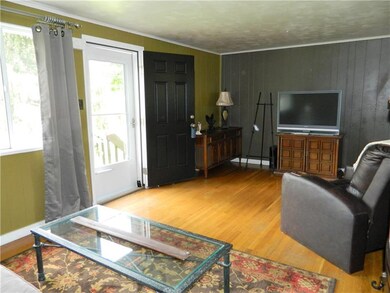 Enter into the living room with accent paint and h