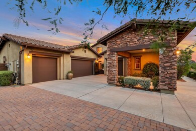 Portico Parking and 4 car Garage