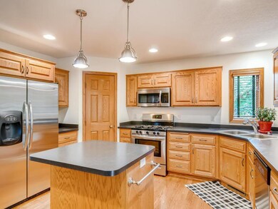 Kitchen features stainless appliances, pantry and 