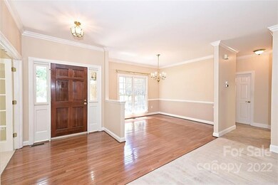 Foyer and Dining Room are wood flooring