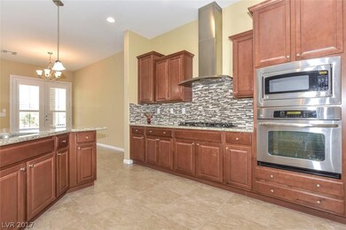 KITCHEN WITH MAPLE CABINETS