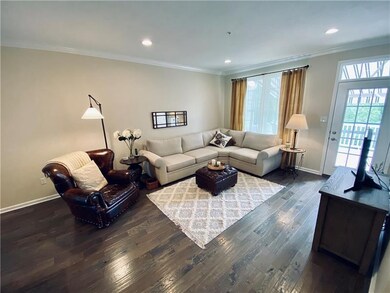 Living room has door to the rear deck.