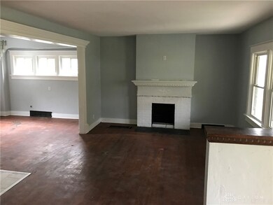 Living Rm. House has vinyl replacement windows.