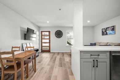 Dining area featuring recessed lighting, light wo