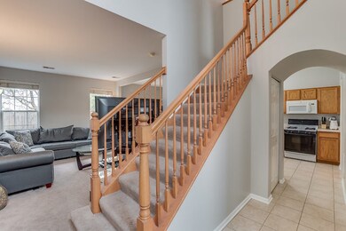 Welcoming two-story entryway.