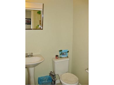 Partial Bath. Easy access for guests to use on mai