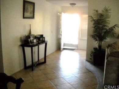 FORMAL ENTRY WITH TILE FLOORING