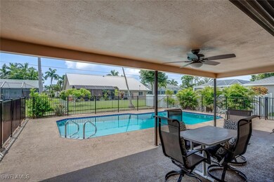 Relax under the covered patio or enjoy a dip in th