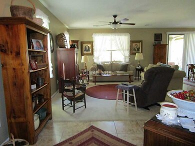 Property Photo. Entrance from foyer to great room.