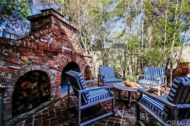 Beautiful outdoor fireplace and seating area.