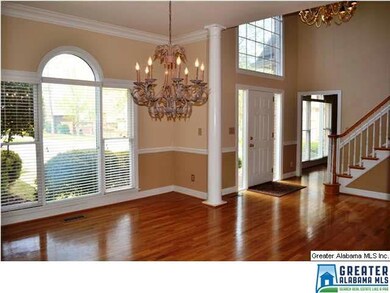 Elegant formal dining room with updated lighting, 