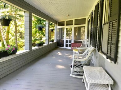 Wrap-around sun porch.
