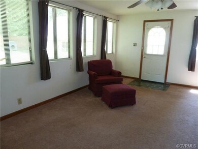 What a bonus! Additional sunny living space.