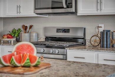 Kitchen featuring appliances with stainless steel