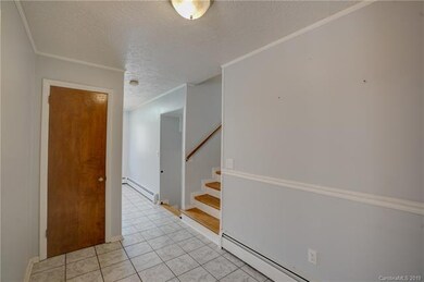 Foyer looking into breakfast nook