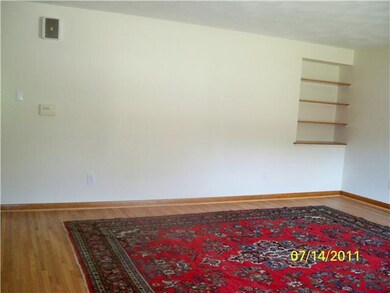 Living Room LR has Built In book shelf