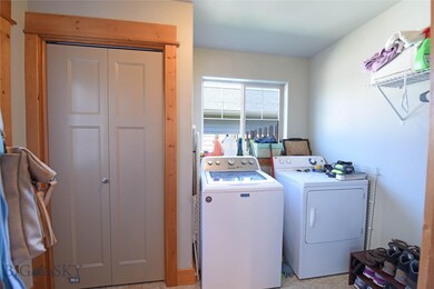Mudroom/Laundry Room off of kitchen and rear patio