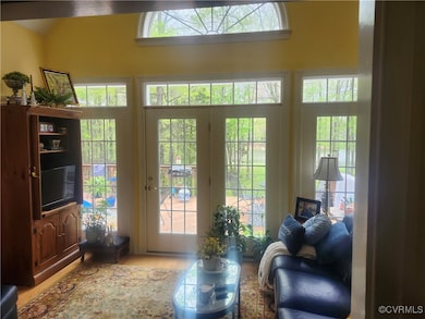 Doorway to outside featuring light wood-style floo