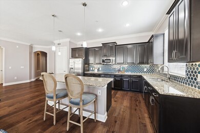 Alternate view of Kitchen, featuring handsome cabi