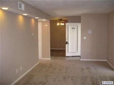LIVING ROOM VIEW #2 TOWARD ENTRY & DEN