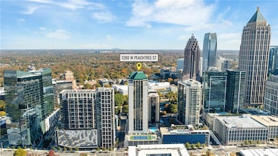 Stunning panoramic city views showcasing Atlanta’s skyline from the 23rd floor. A true “wow” moment the second buyers see the listing.