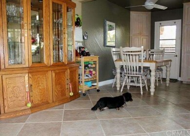 Dining area off family room and kitchen.  Doggie n