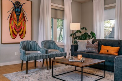 This cheery living room is full of natural light.
