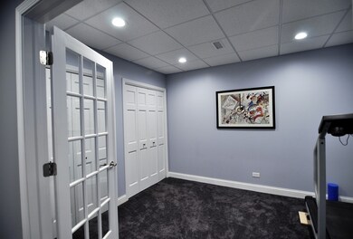 French doors & a full wall of deep closets