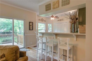 The Family Room is open to the Kitchen and has a bar for extra seating