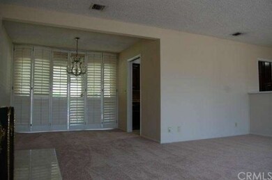 Dining area with sliding glass doors to covered pa
