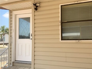 Front Entry Under Carport