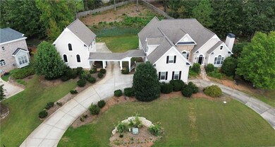 Stunning aerial view that highlights the home’s standout curb appeal.