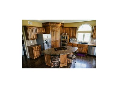 Spacious Kitchen features granite countertops, sta