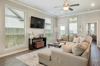 Living room featuring wood finished floors, a ceil