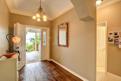 Updated entry with tile/wood look floors