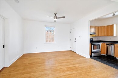 Entry room with kitchen off to the side