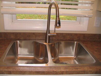 Stainless sink and faucet.