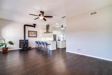 Engineered hardwoods, wood burning fireplace, pre-wired for 7.1 surround sound!