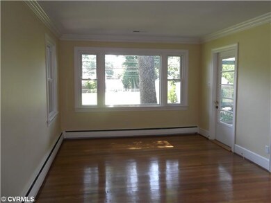 Living Room - Gleaming wood floors, big picture wi