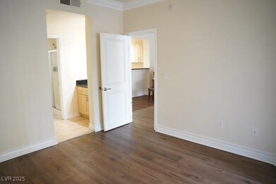 Unfurnished room featuring dark wood finished floo