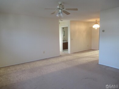SPACIOUS LIVING ROOM WITH CEILING FAN  FRESHLY PAI