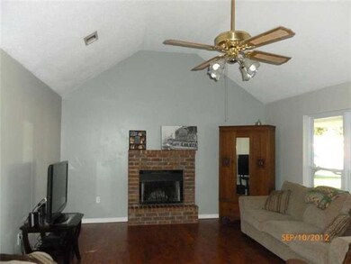 Living Room. cherrywood laminate floors, vaulted c