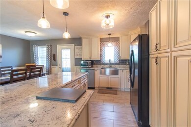 Stunning kitchen with granite counters and new cab