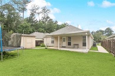 Back yard and rear of home