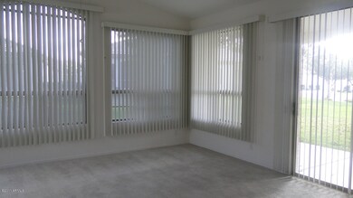 Great room with door to covered patio