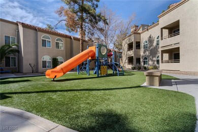 Community play area featuring a lawn