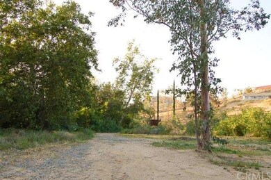 driveway also circles around back out to the entra